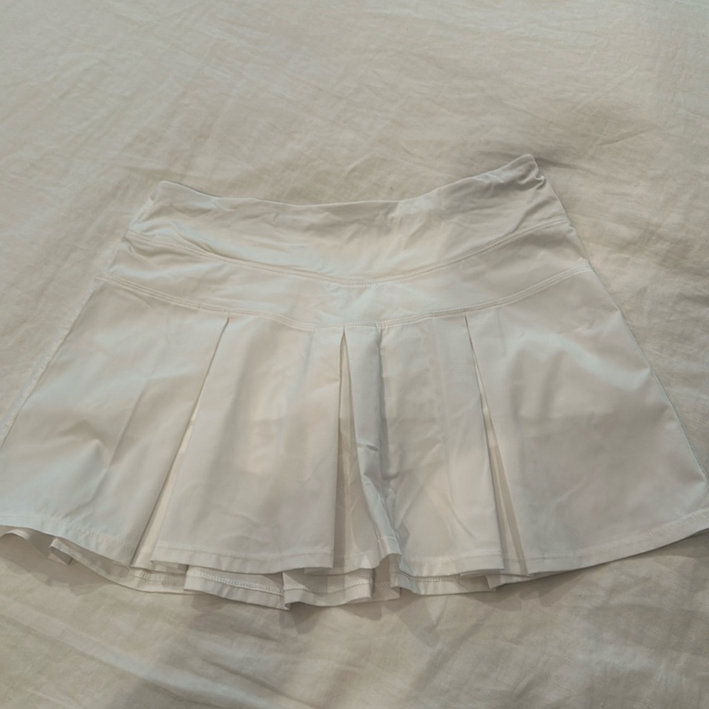 Ivivva tennis skirt. White. Size 14. Never worn. Girls.